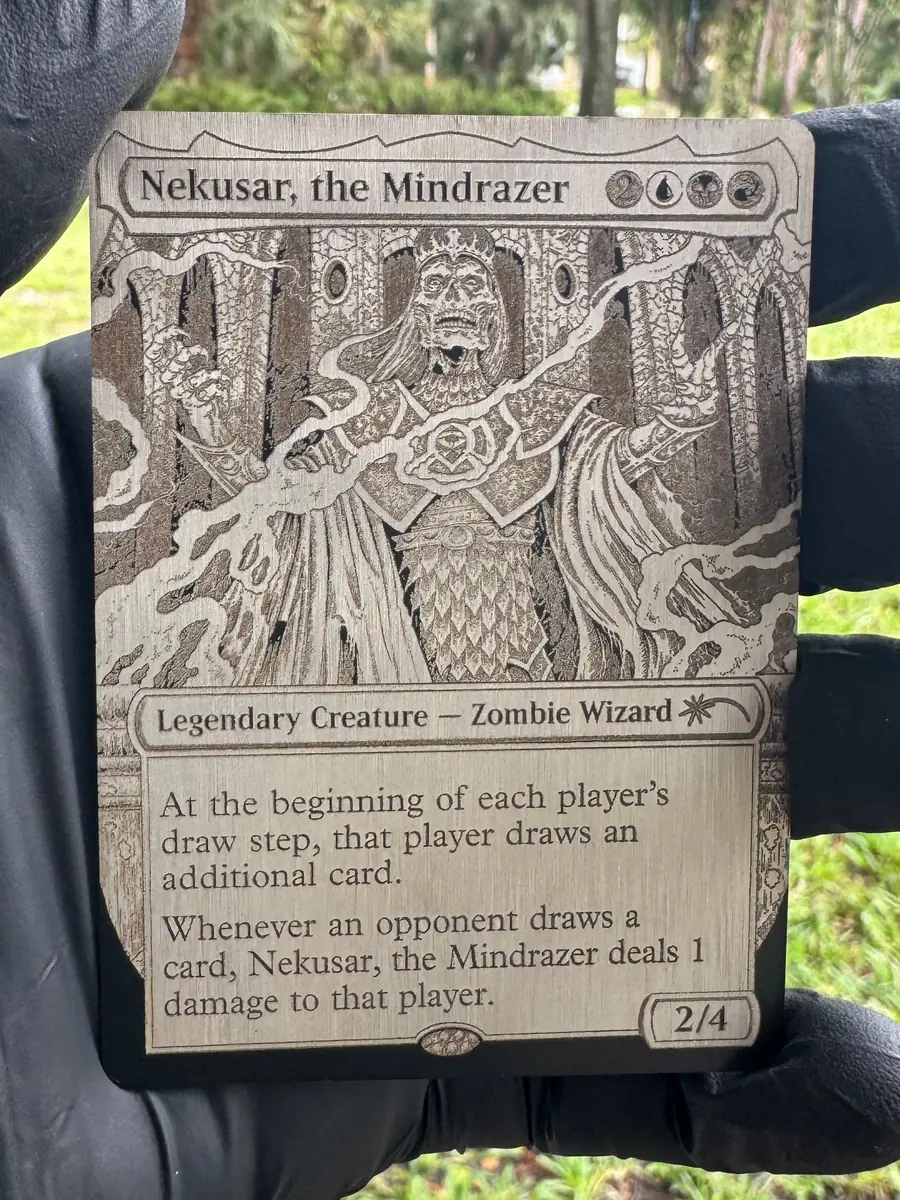 Nekusar, the Mindrazer, engraved into a stainless steel plate and held in the hand