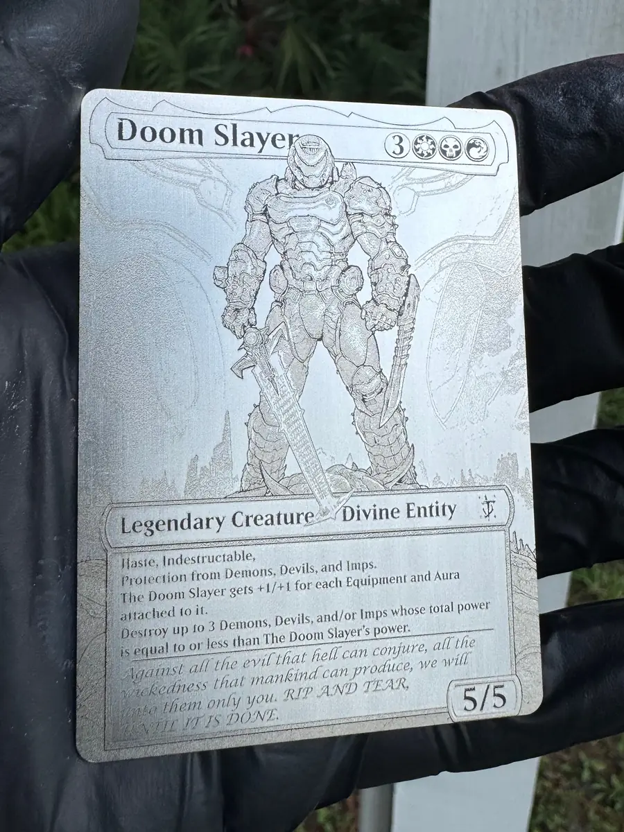 Doom Slayer, engraved into a stainless steel plate and held in the hand